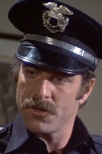 Rick Goldman as Cop #2 in Clue (12/1985)