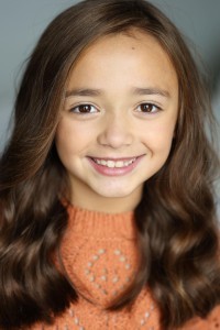 Paisley Day Herrera as Town Kid (voice) in Encanto (10/2021)