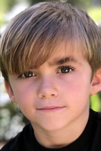 Nico Tirozzi as Eight-Year-Old Clint in Spirited (11/2022)