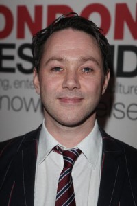 Reece Shearsmith as John Woolf in See How They Run (09/2022)