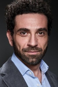 Alessandro Gruttadauria as Father Gianni in The Pope's Exorcist (04/2023)